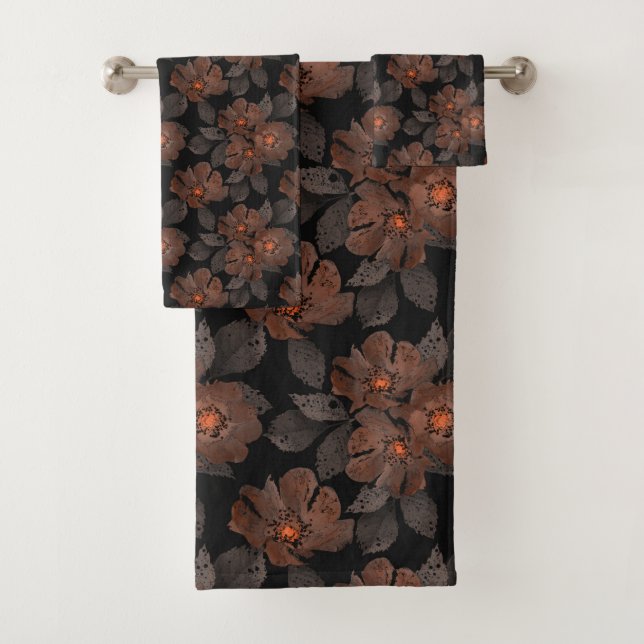 Fleurs orange et marron sur fond noir. (En situation)