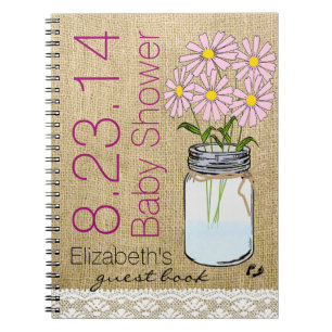 Fleurs roses dans le livre d'invité de baby shower