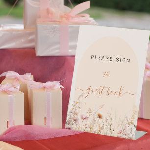 Fleurs sauvages cintrent le panneau pêche signer l