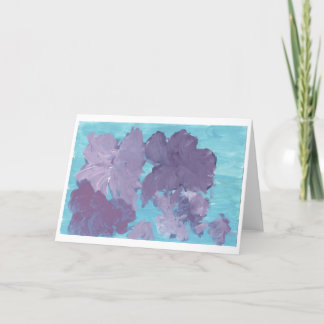 Fleurs violettes sur carte arrière - plan bleue