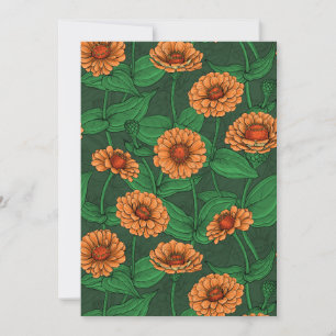 Fleurs Zinnia orange, feuilles verts sur vert fonc