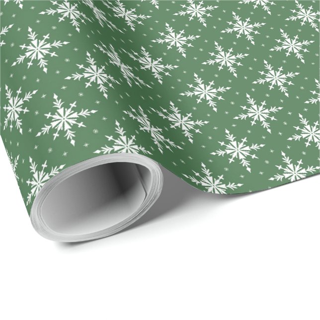 Flocons de neige blancs sur un papier cadeau vert  (Coin rond)