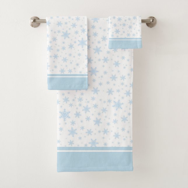 Flocons de neige bleu clair modernes sur serviette (En situation)