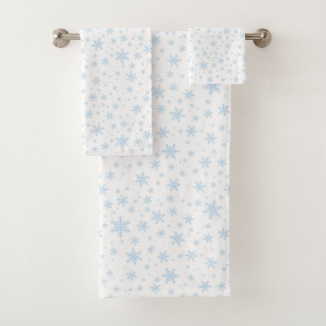 Flocons de neige bleu clair sur fond blanc (En situation)
