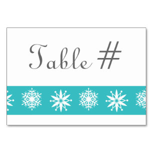 Flocons d'hiver en carte de table turquoise