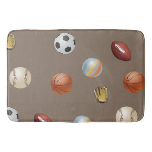 Folâtre la boule sur un tapis de bain