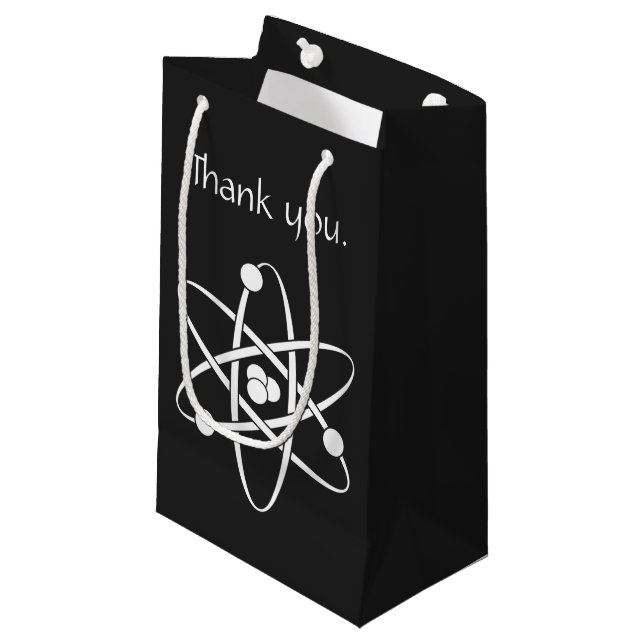 Forces Attractives dans un Sac Cadeau Noir (Devant Angle)