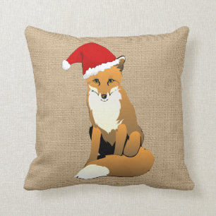 Fox de Noël sur le coussin de toile de jute de