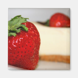 Fraise et un aimant de gâteau au fromage