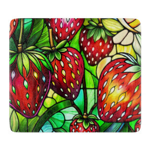 Fraises sur planche à découper en verre de vigne