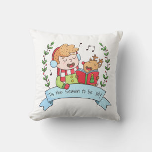 Garçon des chants de Noël et Renne Coussin de jet