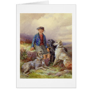 Garçon écossais avec des chiens-loup dans un