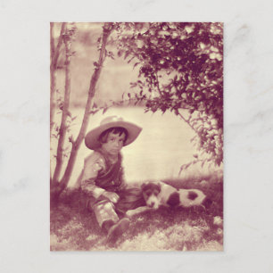 Garçon vintage avec chien au repos carte postale