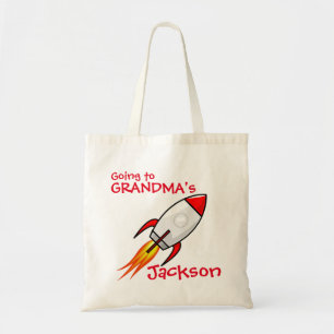 Garçons allant au sac durant la nuit Rocket de