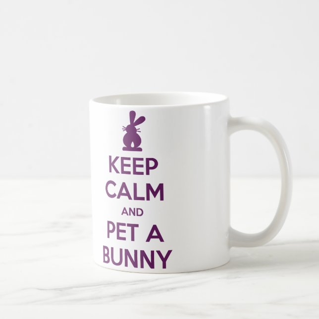 Gardez l'animal familier calme une tasse de lapin (Droite)