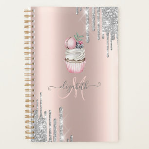Gâteau avec monogramme en or rose et gouttes de pa