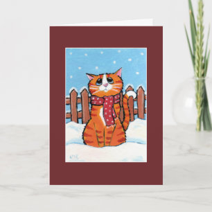 Gingembre Tabby Chat dans la carte de Noël de neig