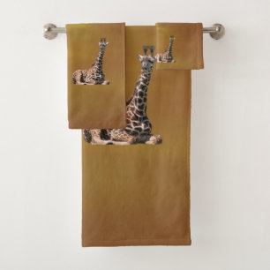 Girafes au brun de coucher du soleil