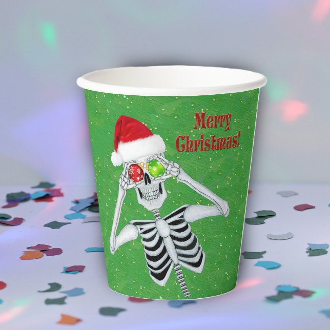 Gobelets En Papier Noël Squelette Snowflake Ornements Casquette Vert (Fun Merry Christmas skeleton ornament eyes Santa Hat on green party drinking paper cups.)