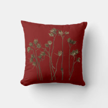 Gousses de graines sur un coussin de jet