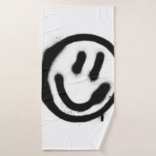 graffiti visage souriant émoticon en noir sur blan