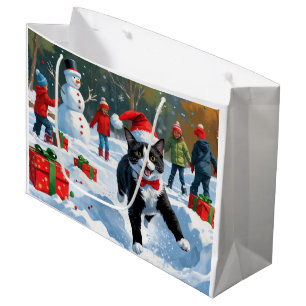 Grand Sac Cadeau Chat Tuxedo Courant dans la Neige avec un Chapeau 