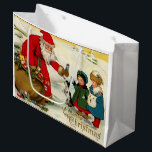 Grand Sac Cadeau Père Noël vintage avec enfants<br><div class="desc">Jolie scène hivernale vintage montrant Père Noël donnant des jouets aux enfants en attente pendant que leur chiot demande de l'attention. L'image a été numériquement restaurée.</div>