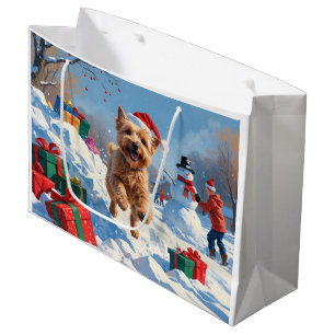 Grand Sac Cadeau Terrier Wheaten courant dans la neige avec un chap