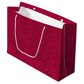 Grand Sac Cadeau Un sac-cadeau rouge scintillant avec des poignées