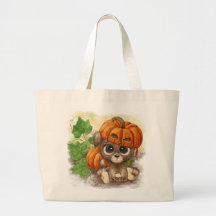 Petit chiot dans un casquette citrouille