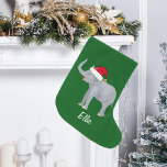 Grande Chaussette De Noël Eléphant de Noël mignon<br><div class="desc">Ce beau stock d'éléphant de Noël présente un bel éléphant souriant portant un chapeau de Père Noël rouge avec un tronc surélevé. Ce joli stock de Noël animal personnalisé est décoré d'un charmant arrière - plan de vacances vert. Personnalisez avec votre propre texte en bas pour un cadeau élégant.</div>