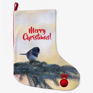 Grande Chaussette De Noël Un oiseau d'hiver et un ornement de Noël sur un
