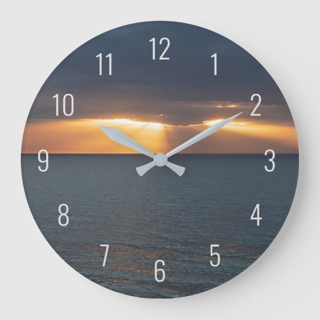 Grande Horloge Ronde Coucher de soleil sur l'océan en traversant les nu (Recto)