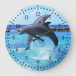 Grande Horloge Ronde Dauphins dans le bel océan bleu