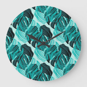 Grande Horloge Ronde Design feuille de palmiers tropicaux vert.