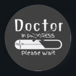 Grande Horloge Ronde Docteur en cours Veuillez patienter<br><div class="desc">"Docteur en cours,  Veuillez patienter" Horloge murale parfaite pour les futurs médecins,  Vous pouvez le donner à vos futurs amis médecins.</div>