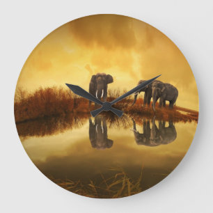 Grande Horloge Ronde Eléphants asiatiques en Thaïlande sous un coucher