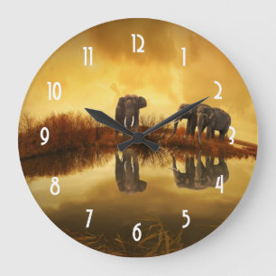 Grande Horloge Ronde Eléphants asiatiques en Thaïlande sous un coucher