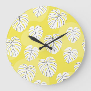Grande Horloge Ronde Feuilles de Monstera, arrière - plan jaune vif.