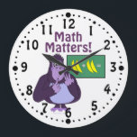 Grande Horloge Ronde Funny Counting Gorilla Math Matters Custom Clock<br><div class="desc">This custom wall clock has a funny purple cartoon gorilla trying to figure out a math Problm about bananias. Le compte d'It's counting on its fingers and looking rather confused. It says Math Matters ! You can change this in the emplate if you want. Click the customize button to change...</div>