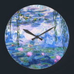 Grande Horloge Ronde Lys d'eau rose Monet<br><div class="desc">Une horloge murale acrylique de nénuphars rose Monet avec de belles nénuphars roses flottant dans un étang bleu calme avec des nénuphars. Un grand cadeau Monet pour les amateurs d'impressionnisme et d'art français. Impressionnisme nature serein avec de belles fleurs et paysage d'étang pittoresque.</div>