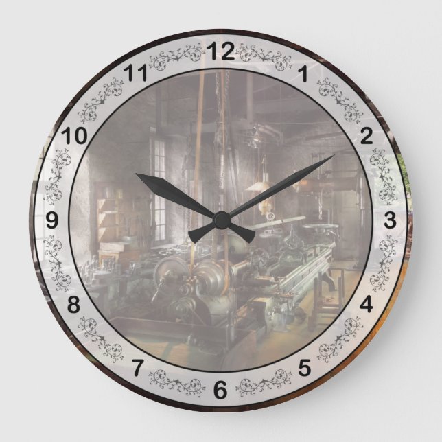 Grande Horloge Ronde Machiniste - Lathe - A long lathe (Recto)