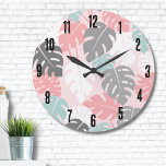 Grande Horloge Ronde Monstera moderne Motif tropical<br><div class="desc">Ce motif moderne en feuille de monstère,  agrémenté de roses apaisantes,  turquoise (presque un vert de mer),  blanc et gris,  invitations un sentiment de tranquillité et d'élégance contemporaine. Ce motif est un complément élégant et polyvalent à votre vie. Monstera moderne tendance Feuille Motif Tropical Grande horloge</div>