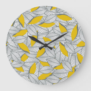 Grande Horloge Ronde Motif de feuilles gris et jaune.