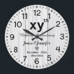 Grande Horloge Ronde Noms personnalisés pour l'anniversaire de mariage<br><div class="desc">Horloge de fleurs pour le 1er anniversaire de mariage avec noms personnalisés et année,  cadeau d'un an de mariage pour un couple,  Noël du 1er anniversaire de mariage  Horloge personnalisée 2025,  idées de cadeaux pour le 1er anniversaire pour un couple Horloge</div>