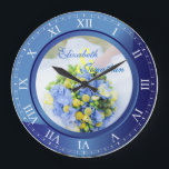 Grande Horloge Ronde Numéro de Wedding Anniversary Blue Sapphire<br><div class="desc">A lovely clock in blue sapphire tones, avec Roman numéro. The frame that functions as part of the clock is a frame for your favorite wedding photographe. Keep the sample image of blue, yellow and green spring floral bouquet, or replace it with your own image for full personalization. Add your...</div>