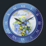 Grande Horloge Ronde Numéro de Wedding Anniversary Blue Sapphire<br><div class="desc">A lovely clock in blue sapphire tones, avec Roman numéro. The frame that functions as part of the clock is a frame for your favorite wedding photographe. Keep the sample image of blue, yellow and green spring floral bouquet, or replace it with your own image for full personalization. Add your...</div>