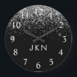 Grande Horloge Ronde Parties scintillant noire argent Monogramme Nom de<br><div class="desc">Parties scintillant étincelante noire et argent brossé Monogramme Nom Horloge. Cela rend le cadeau parfait pour 16 ans,  mariage,  douche nuptiale,  anniversaire,  baby shower ou bachelorette pour quelqu'un qui aime le luxe glam et les styles chic.</div>