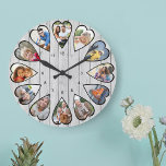 Grande Horloge Ronde Photos en forme de coeur Lumière Gris Bois Grande<br><div class="desc">Créez votre propre horloge multiphoto. Le modèle photo est configuré pour ajouter 12 photos qui sont affichées dans un cadre en forme de coeur. La conception utilise des photos verticales de portrait pour tous les numéros sauf 3 et 9 qui sont en format horizontal paysage. La face de l'horloge a...</div>