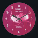 Grande Horloge Ronde Romantique 2 Coeurs Mariage Date Keepsaké<br><div class="desc">Un rendez-vous mariage pour commémorer votre mariage. Un arrière - plan peint de rose foncé avec un look patiné rugueux avec 2 coeurs roses avec des rubans fantaisistes se mêlant et tourbillonnant ensemble dans l'amour. Customisez avec vos informations personnelles.</div>